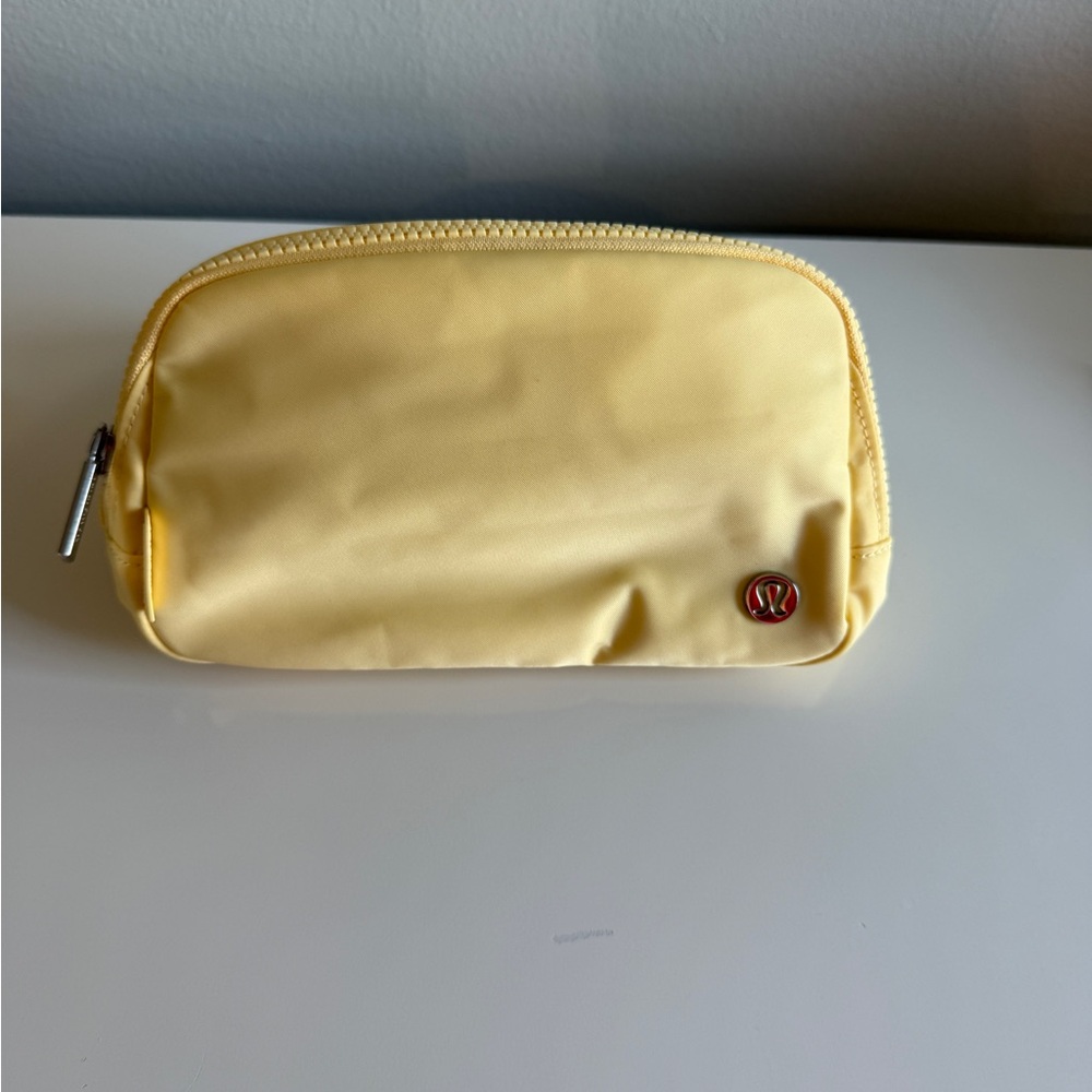 lululemon athletica Sunray Yellow Shoulder Pouch. NWOT